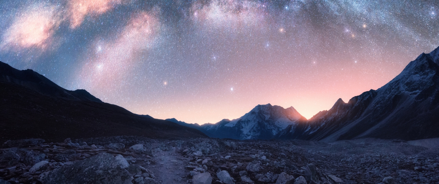 Arched Milky Way and mountains at night. Beautiful landscape